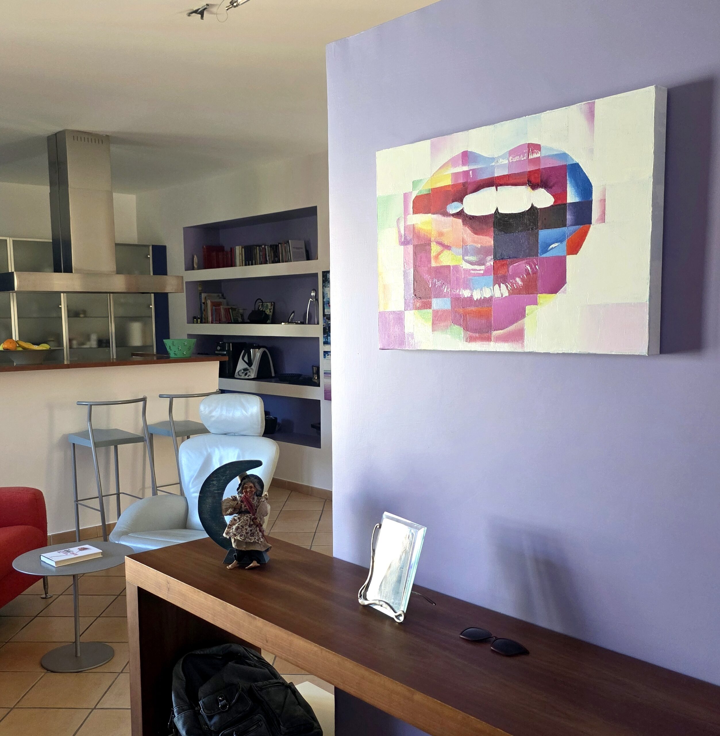 the power of colors violet bookshelf and colorful painting